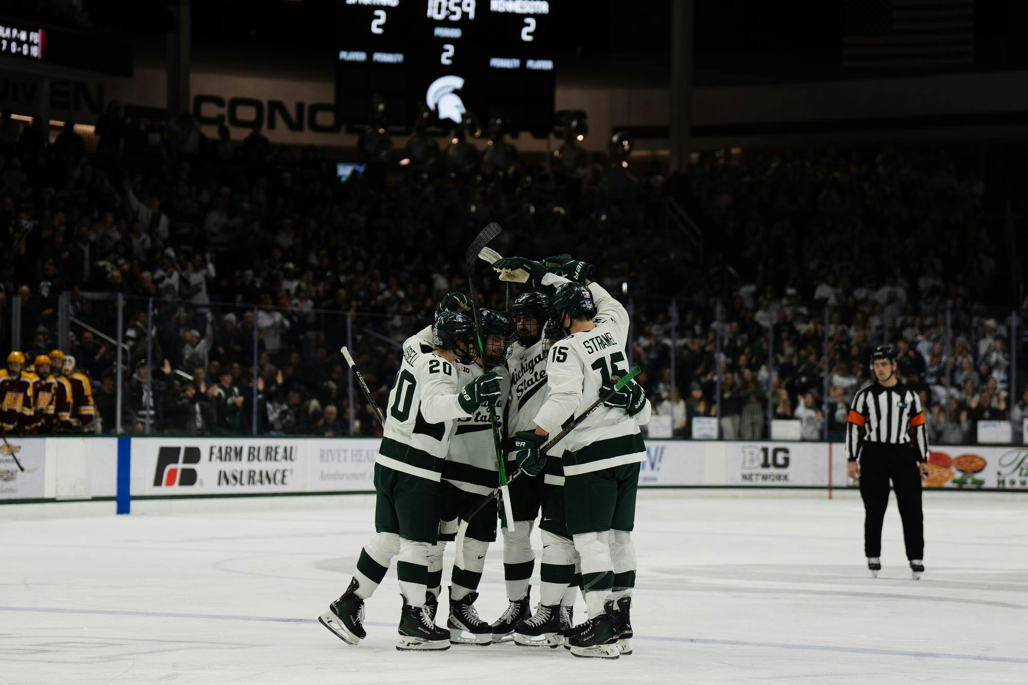 <p>Michigan State hockey players celebrate a goal from senior defenseman David Gucciardi (7) at Munn Ice Arena on Jan. 24, 2025.</p>