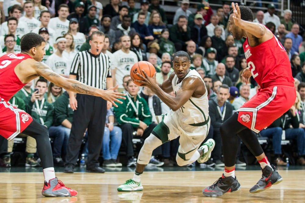 Junior guard Lourawls 'Tum Tum' Nairn Jr. (11) drives the ball toward the basket during the second half of the men's basketball game against Ohio State University on Feb. 14, 2017 at Breslin Center. The Spartans defeated the Buckeyes, 74-66.