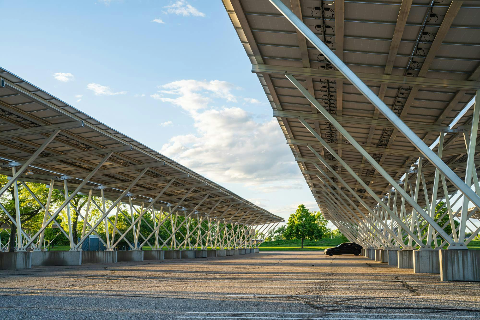 A lone BMW is parked in Lot 89 on Farm Lane and Mt Hope Road during summer break on Michigan State University's campus in East Lansing, Michigan on May 26, 2025. 