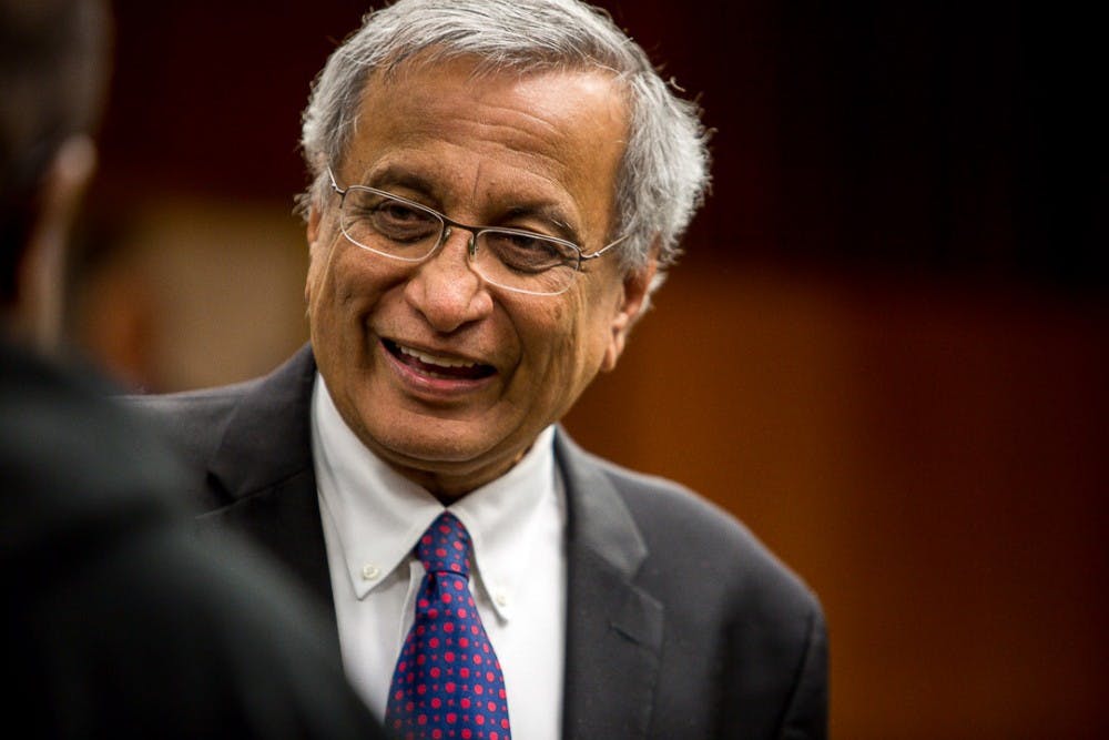  Newly appointed MSU interim president Satish Udpa greets people during a Board of Trustees meeting on Jan. 13, 2019 at the Hannah Administration Building. 