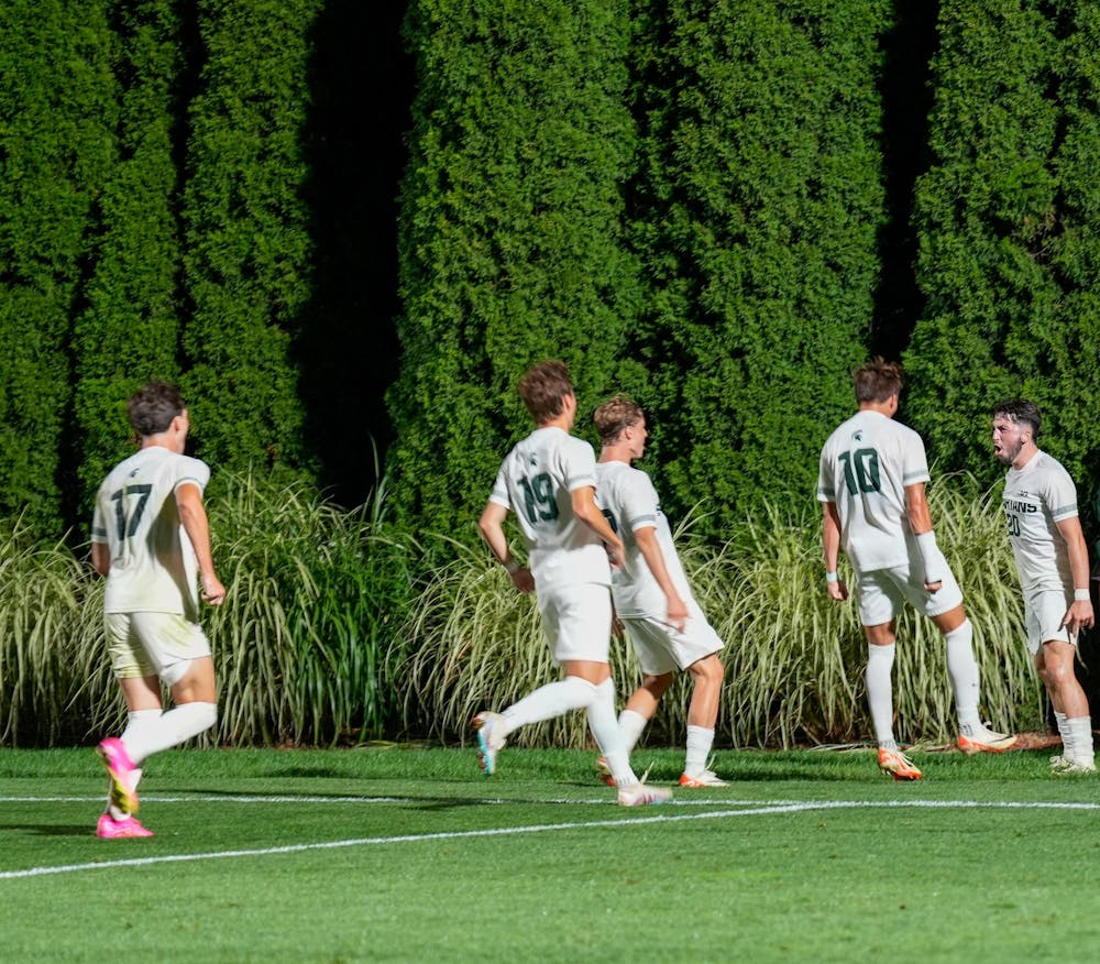 <p>The Michigan State Men’s Soccer Team celebrates as Sean Kerrigan scores the tie-breaking goal against Indiana University at DeMartin Soccer Field on Sept. 22, 2023.</p>