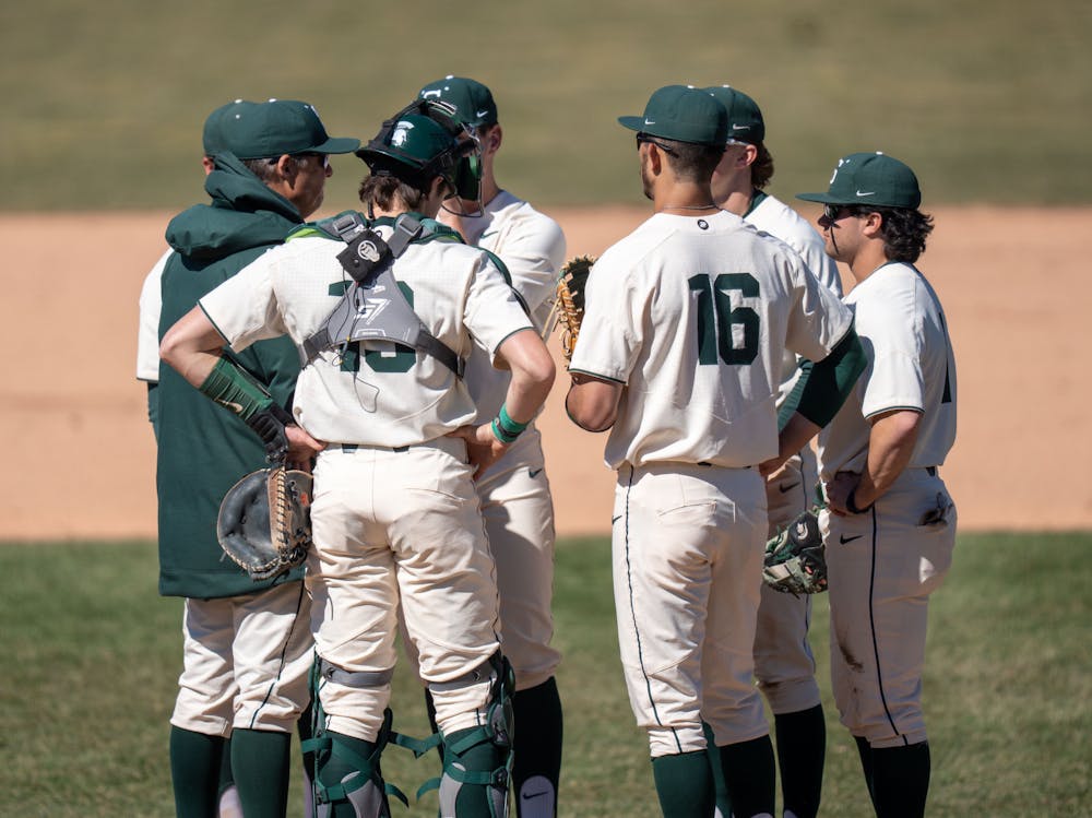MSU takes a time-out to talk about a plan after no home-runs have been hit during the first game yet. MSU would win the game agaist Houston Baptist 1-0 on March 20, 2022