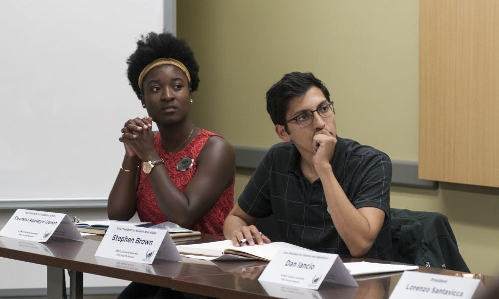 <p>Vice President for Academic Affairs senior Ewurama Appiagyei-Dankah (Left) and Vice President for Student Allocations senior Stephen Brown (Right) during an ASMSU meeting on Aug. 27, 2017 at Student Services. Appiagyei-Dankah is studying Social Relations and Policy with a minor in Spanish and Brown is studying Supply Chain Management with minors in Information Technology and Environmental &amp; Sustainability Studies.</p>