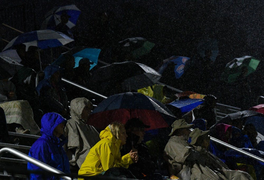 <p>MSU soccer fans tough out heavy rains during the game against Maryland at DeMartin Stadium on October 11, 2019. The Spartans tied the Terrapins 1-1.</p>
