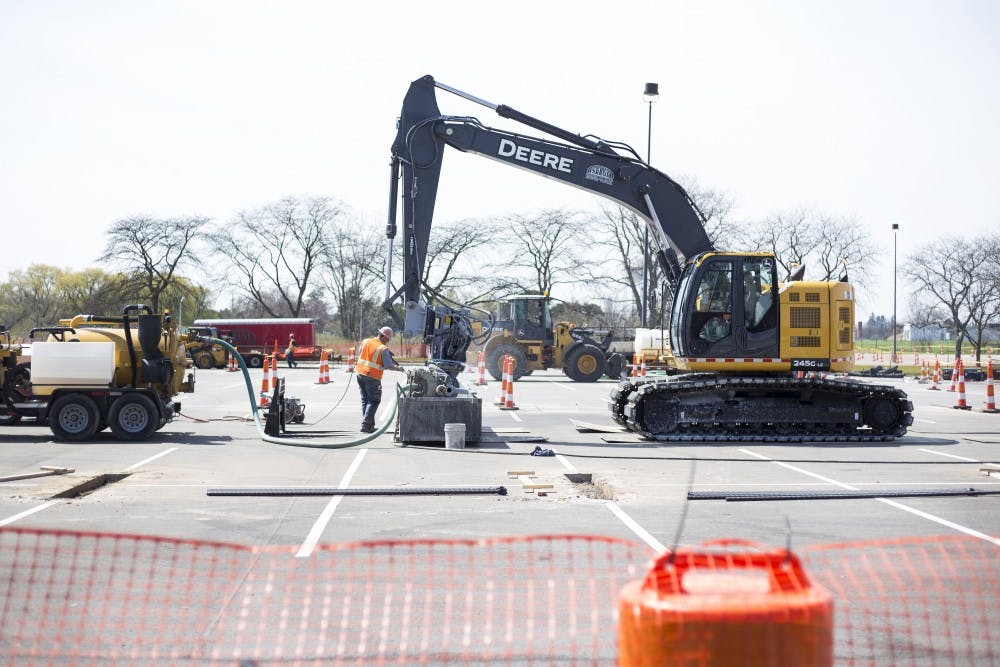 <p>Construction for the installation of solar carports in the lots on the south side of campus on April 18, 2017 at Lot 69 on Mount Hope and Farm Lane.</p>