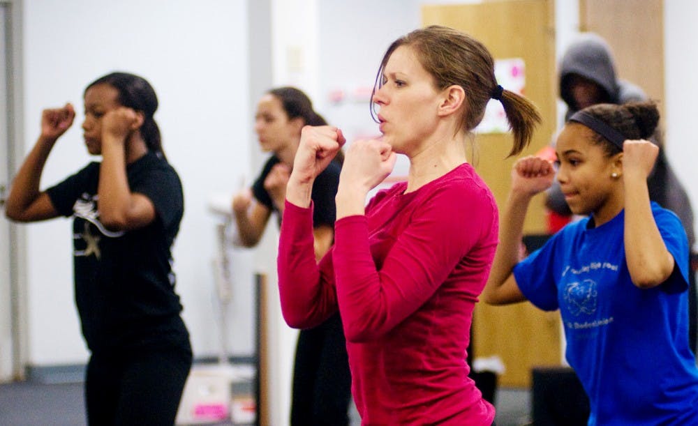 Instructor Tiffany Russel leads a dance class Tuesday at Spartan Dance Center, 3498 Lake Lansing Road. The Center recently moved from it's previous location on Ann Street to the new Lake Lansing Road location. Matt Radick/The State News