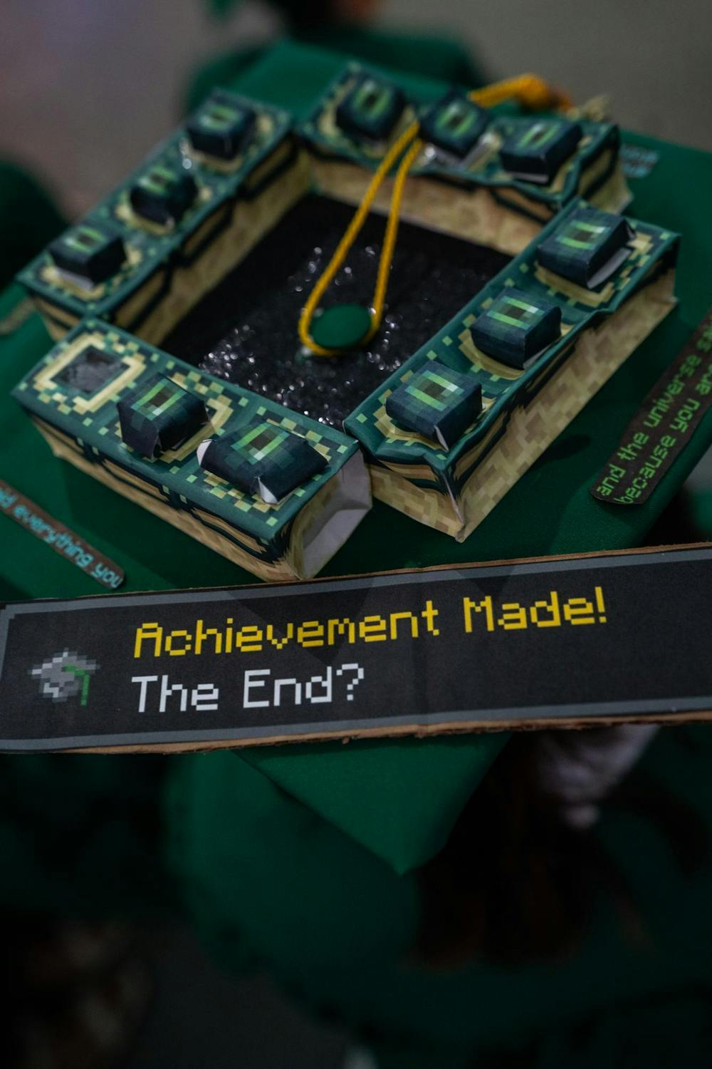 A graduation cap references the popular video game, "Minecraft," during commencements at the Breslin Center on May 3, 2025.