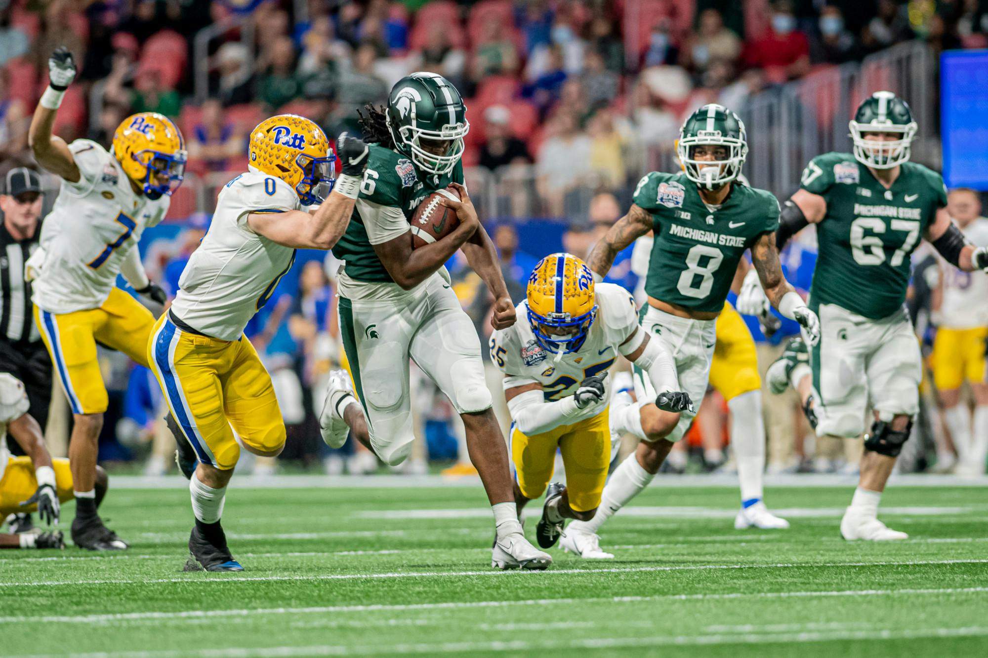 <p>Then redshirt freshman tight end Maliq Carr lowers his shoulder through a tackle during the Spartans&#x27; 31-21 victory against Pitt in the Chick-Fil-A Peach Bowl on Dec. 30, 2021. </p>