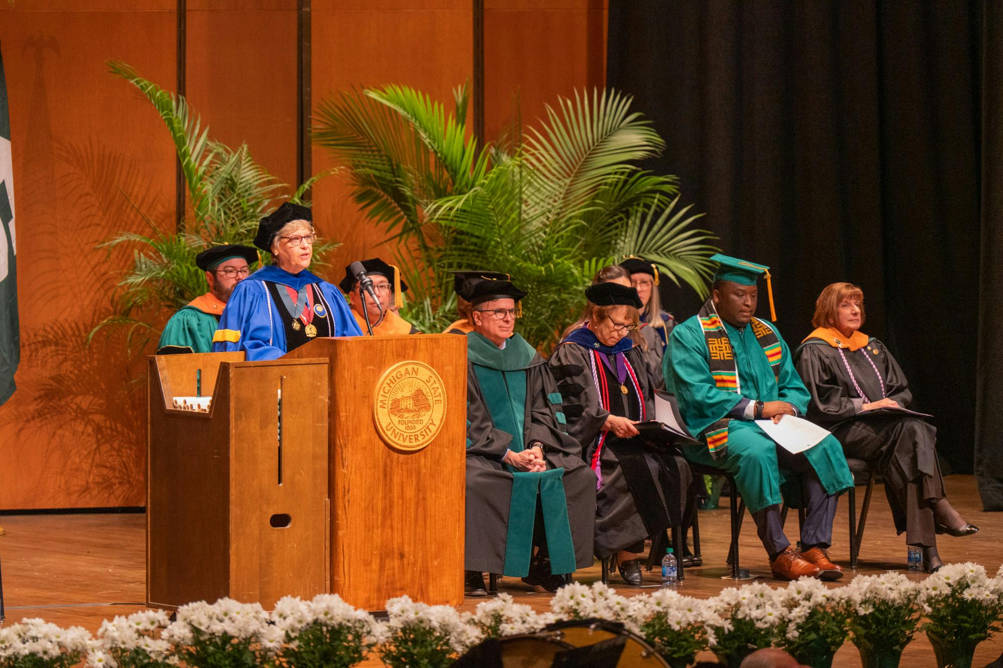 <p>College of Nursing Dean Leigh Small speaks at commencement. The College of Nursing held their commencement at the Wharton Center on May 7, 2022.</p>