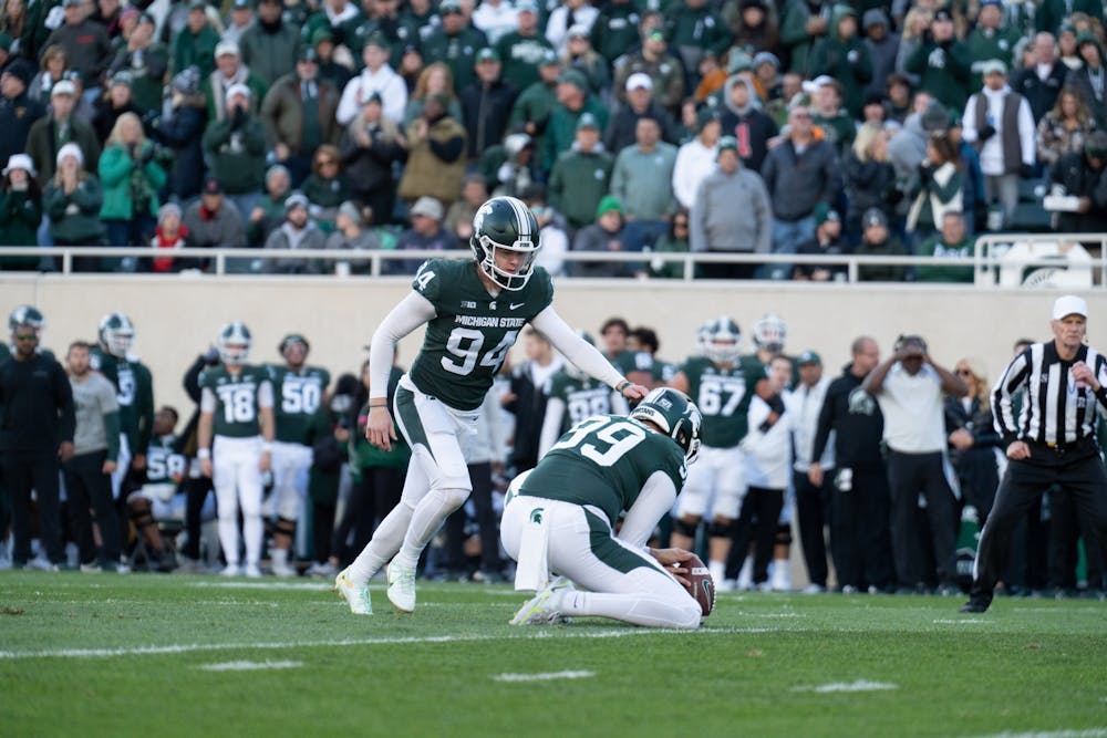 <p>Freshman kicker Jack Stone, 94, kicks for a field goal during the match against the Buckeyes, Oct. 8, 2022.﻿</p>
