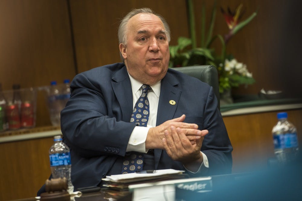 Interim President John Engler speaks during the Board of Trustees meeting on Feb. 16, 2018 at the Hannah Administration Building. (Nic Antaya | The State News)