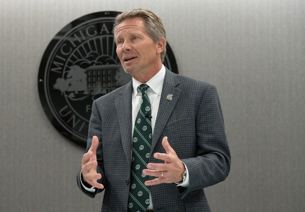 Michigan State University President Kevin Guskiewicz answers media questions after the Oct. 25, 2024 Board of Trustees meeting at the Hannah Administration building.