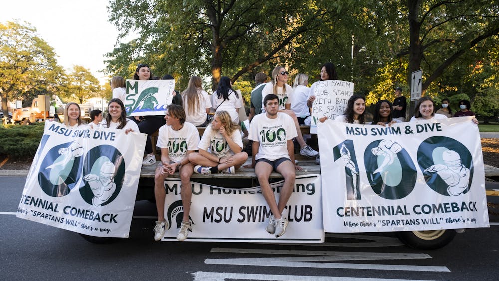 The MSU Swim Club float to save the MSU Swim and Dive Team in the MSU Homecoming parade on October 1, 2021 on Farm Lane in East Lansing. 