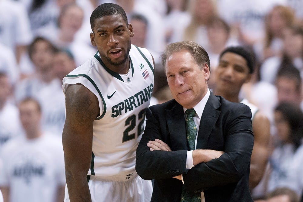 	<p>Junior guard/forward Branden Dawson and head coach Tom Izzo watch the game against Grand Valley State on Oct. 29, 2013, at Breslin Center. <span class="caps">MSU</span> defeated the Lakers, 101-52. Julia Nagy/The State News</p>