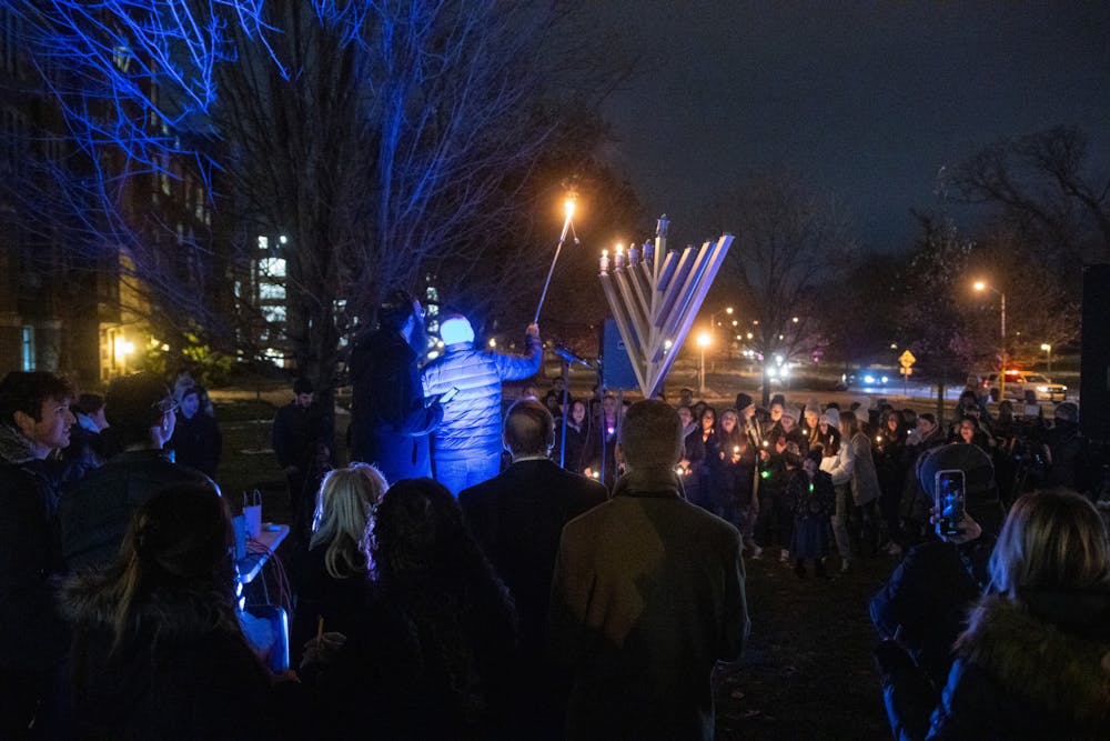 <p>MSU students celebrate Hanukkah with the lighting of the Menorah at the Union on Dec. 1, 2021.</p>