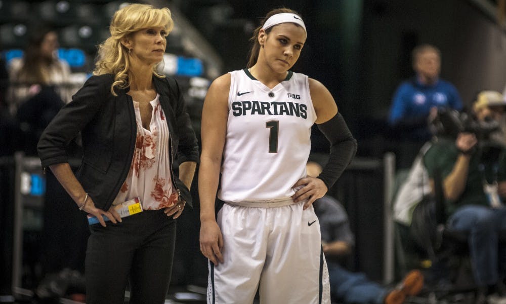 Head coach Suzy Merchant and senior guard Tori Jankoska (1) display emotion during the game against the Maryland in the semi-final round of the women's Big Ten Tournament on March 4, 2017 at Bankers Life Fieldhouse in Indianapolis. The Spartans were defeated by the Terrapins, 100-89.
