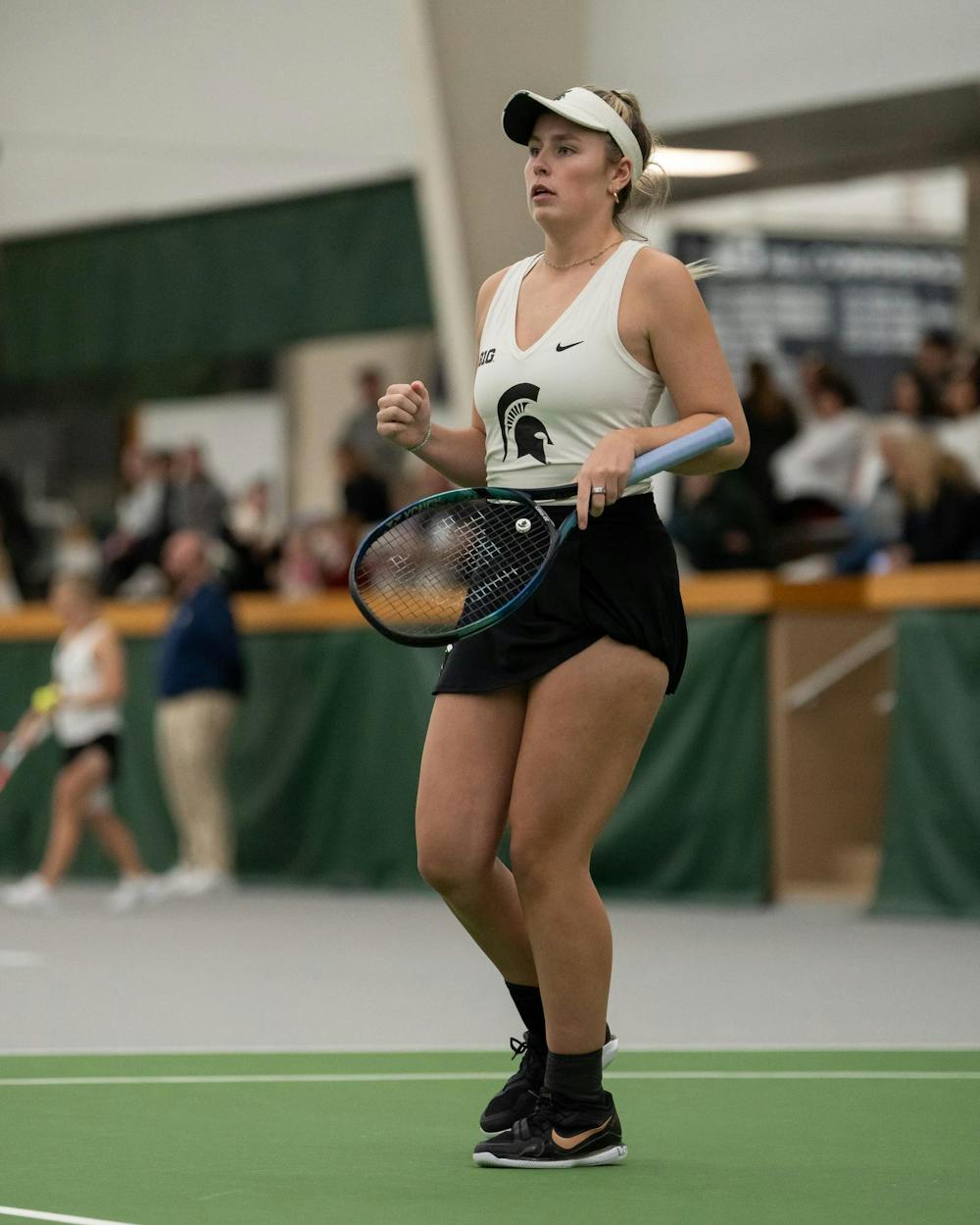 <p>MSU junior Issey Purser plays against Xavier in their doubles match at the MSU Indoor Tennis Center on Jan. 24, 2025. Purser went on to win their double match seven to five.</p>