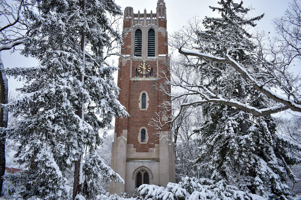 Beaumont Tower is seen on Jan. 26, 2023, following snowfall on campus.