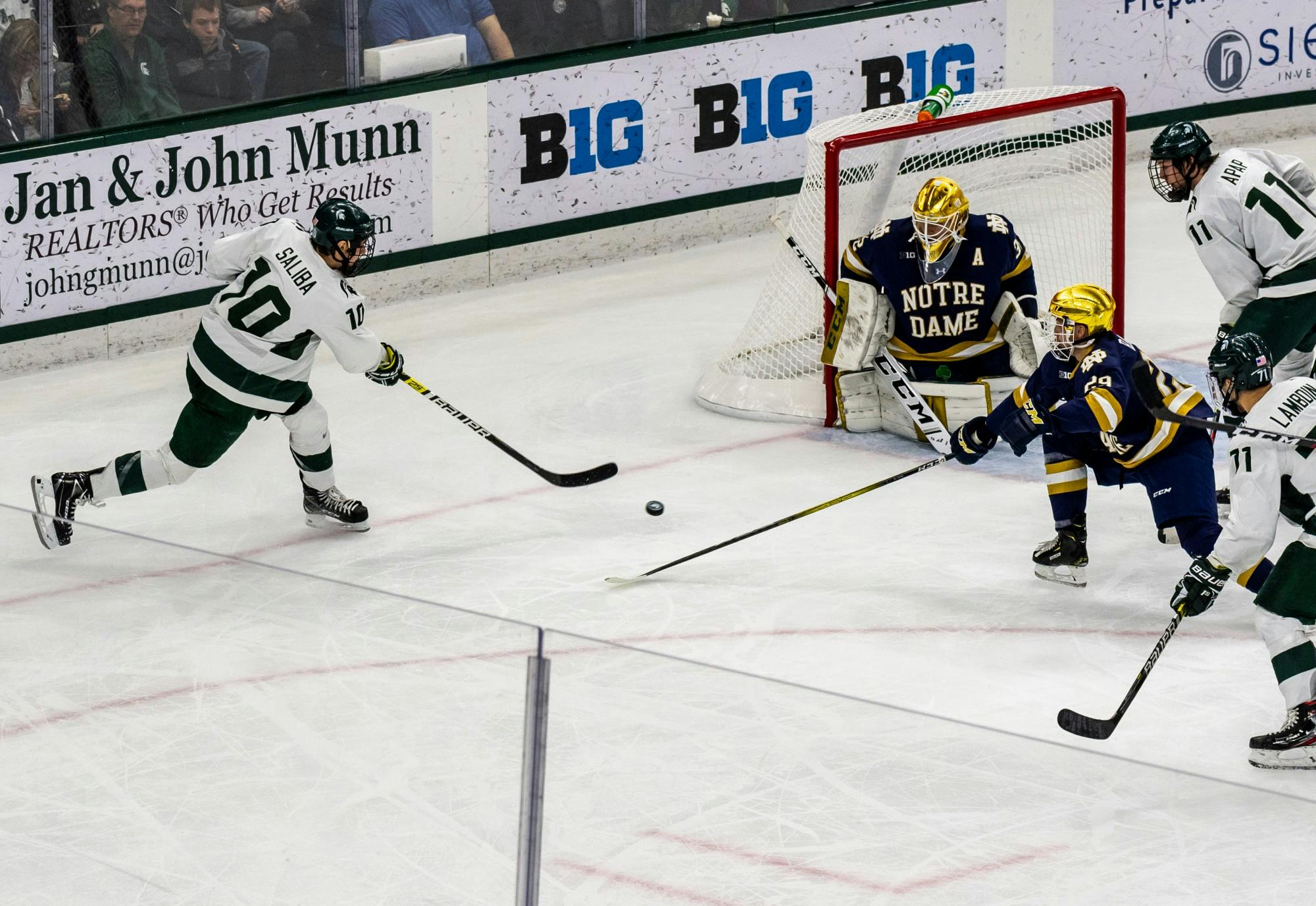 <p>Senior forward Sam Saliba shoots the puck against Notre Dame. The Spartans were defeated by the Fighting Irish, 2-1, at Munn Ice Arena on Nov. 22, 2019. </p>