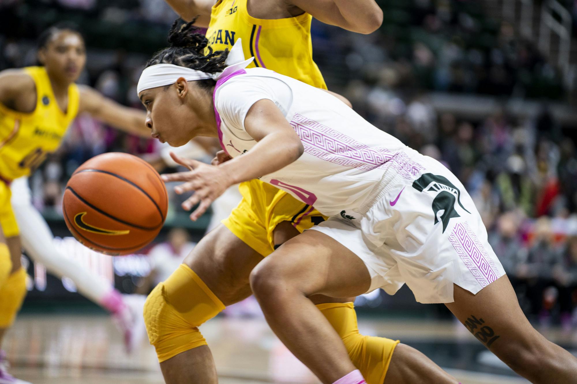 <p>Freshman guard DeeDee Hagemann (0) dribbles the ball during the game against Michigan on Feb. 10, 2022, at the Breslin Center. The Spartans defeated the Wolverines 63-57.</p>