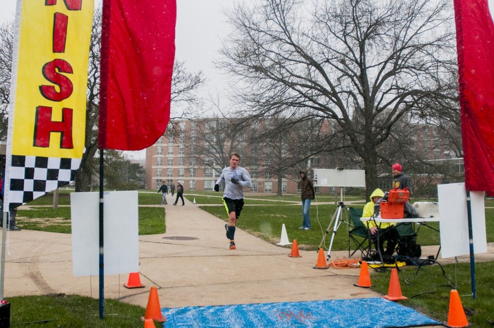 History, philosophy and sociology of science freshman Jared Babcock approaches the finish line during the Hope Project's 5k on April 2, 2016 at Conrad Hall. Hope Project is an on-campus organization that raises funds for schooling of children in developing countries.