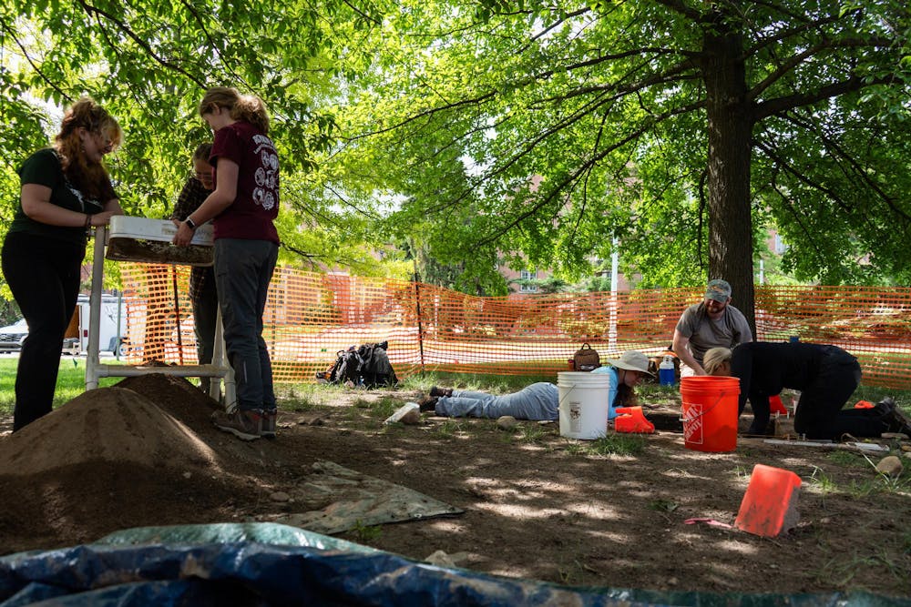 <p>Members of the Campus Archaeology Program work on the old observatory site in East Lansing, Mich., on June 15, 2026.</p>