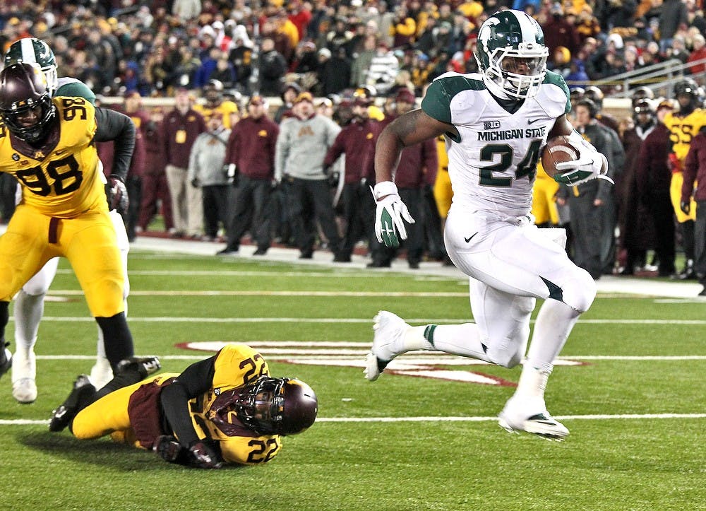 	<p>Junior running back Le&#8217;Veon Bell jumps into the end zone, leaving would-be Minnesota tacklers in his wake, on an 8-yard touchdown run in the fourth quarter at <span class="caps">TCF</span> Bank Stadium in Minneapolis, Minn. <span class="caps">MSU</span> won, 26-10, as Bell rushed for a career-high 266 yards on 35 carries on Saturday, Nov. 24, 2012. Martin Levison/Minneapolis Star Tribune/MCT</p>