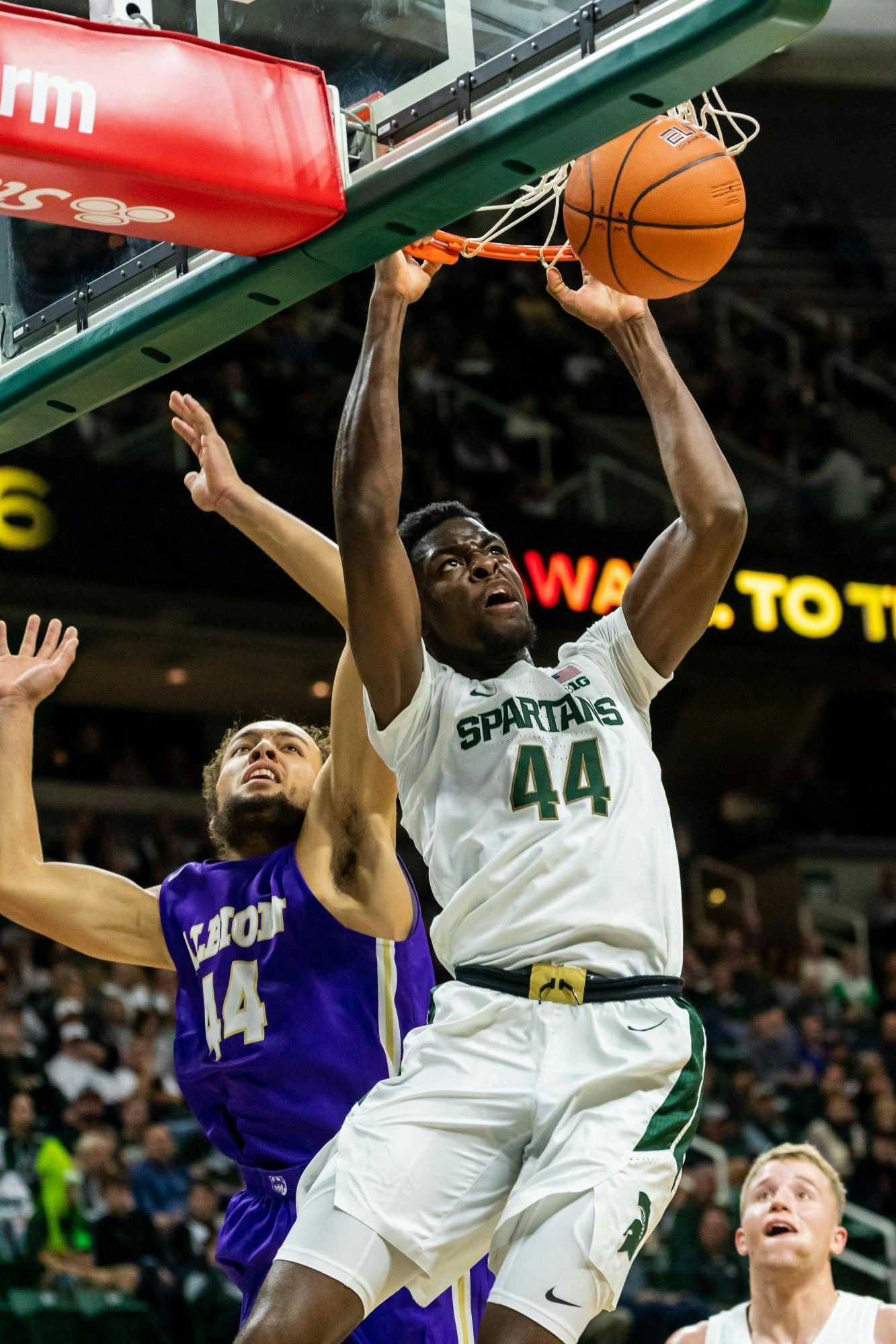 <p>Sophomore forward Gabe Brown dunks the ball against Albion College. The Spartans led the Britons, 40-25, at half at the Breslin Student Events Center on Oct. 29, 2019. </p>