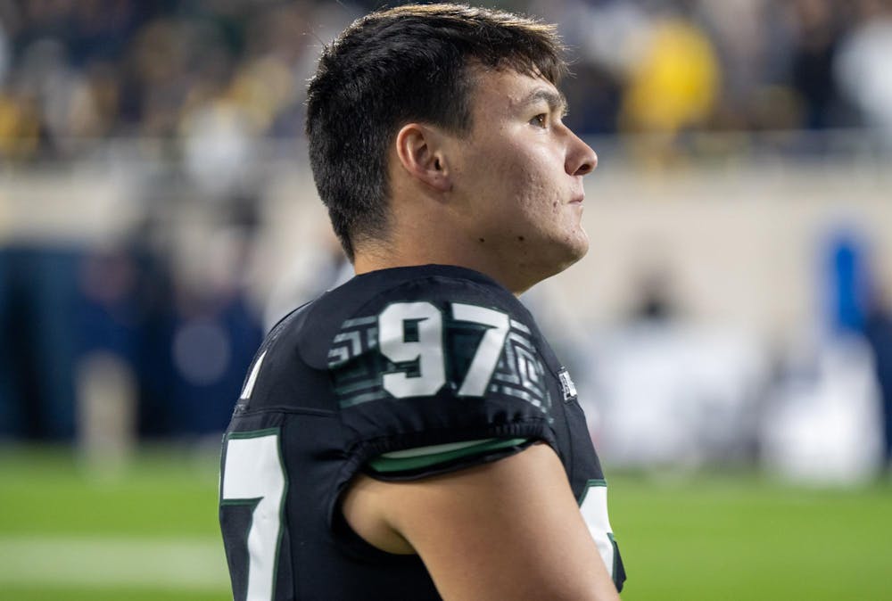 <p>Red Shirt Senior Jonathan Kim (97) on the sideline during MSU's game against University of Michigan at Spartan Stadium on Oct. 21, 2023.</p>