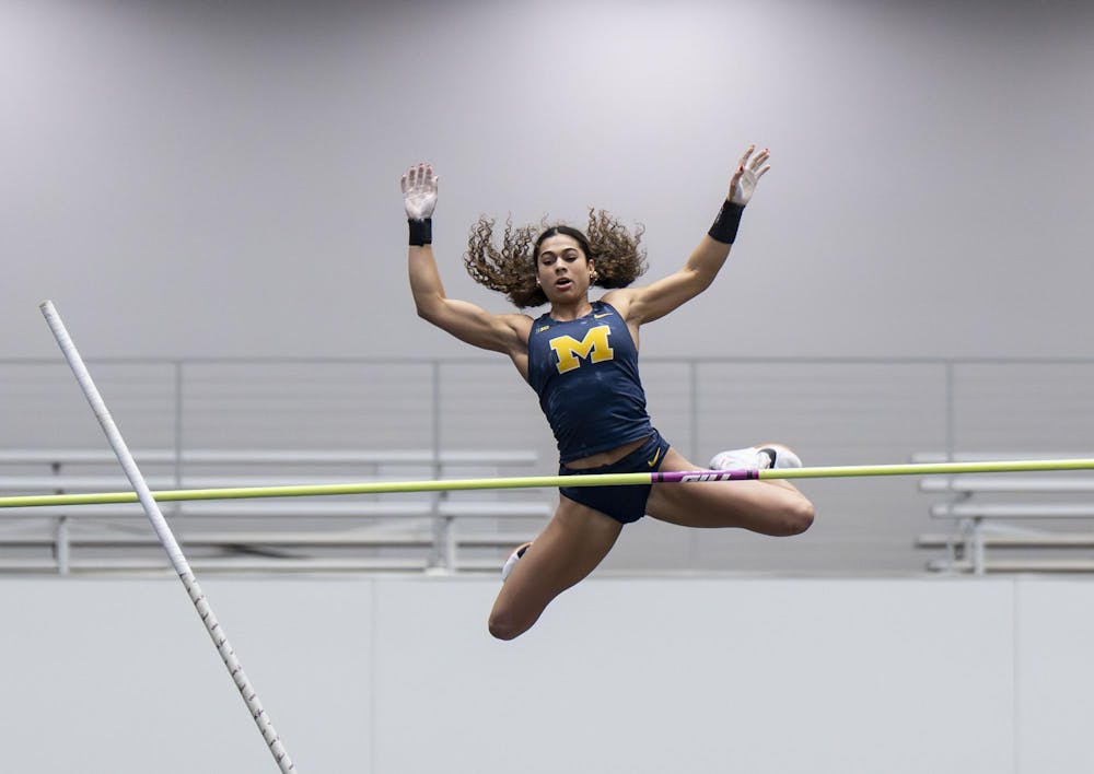 <p>A University of Michigan pole vaulter jumps at the Silverston Invitational track and field competition held in Ann Arbor, Mich. on Feb. 20, 2026.&nbsp;</p>