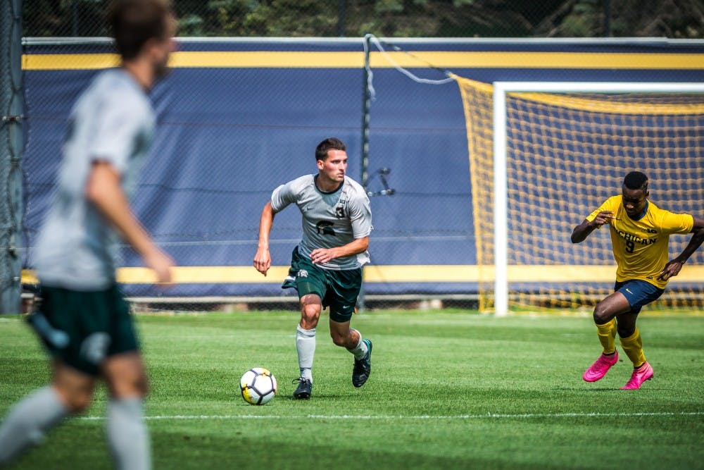Senior defender Jimmy Fiscus (3) scans the field during the game against the University of Michigan on Sept. 17, 2017 at U-M Soccer Stadium. The Spartans defeated the Wolverines, 1-0.