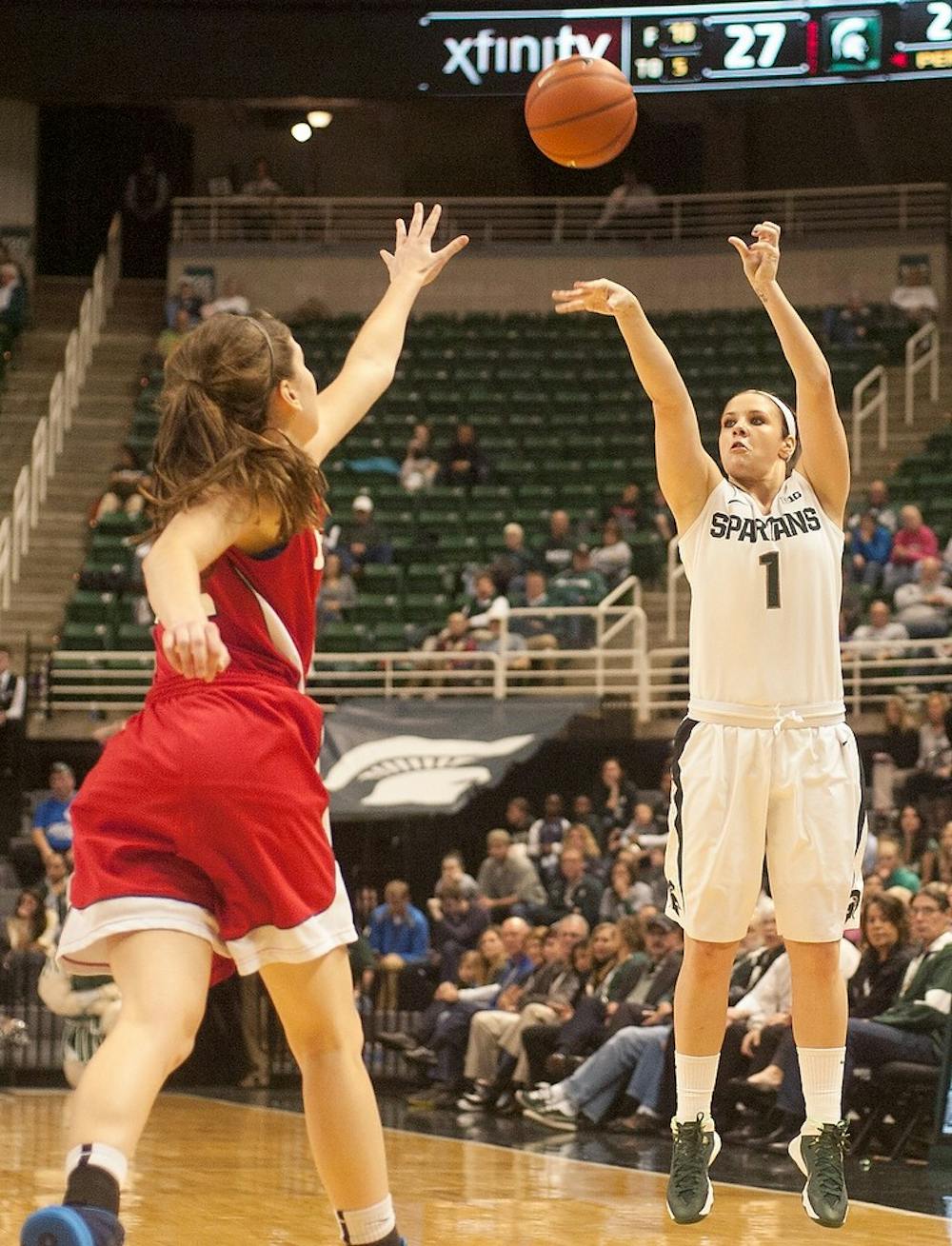 	<p>Freshman guard Tori Jankoska shoots a three-pointer during the game against Dayton on Nov. 17, 2013, at Breslin Center. Jankoska was one of the leading scorers with 24 points and helped the Spartans to an overtime victory, 96-89. Micaela Colonna/ The State News</p>