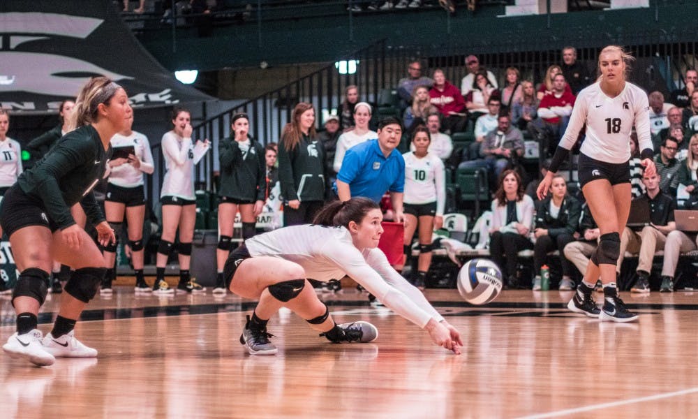 Redshirt senior outside hitter Autumn Bailey (2) passes a ball during the game against Indiana on November 18, 2017, at Jenison Fieldhouse. The Spartans defeated the Hoosiers, 3-0.