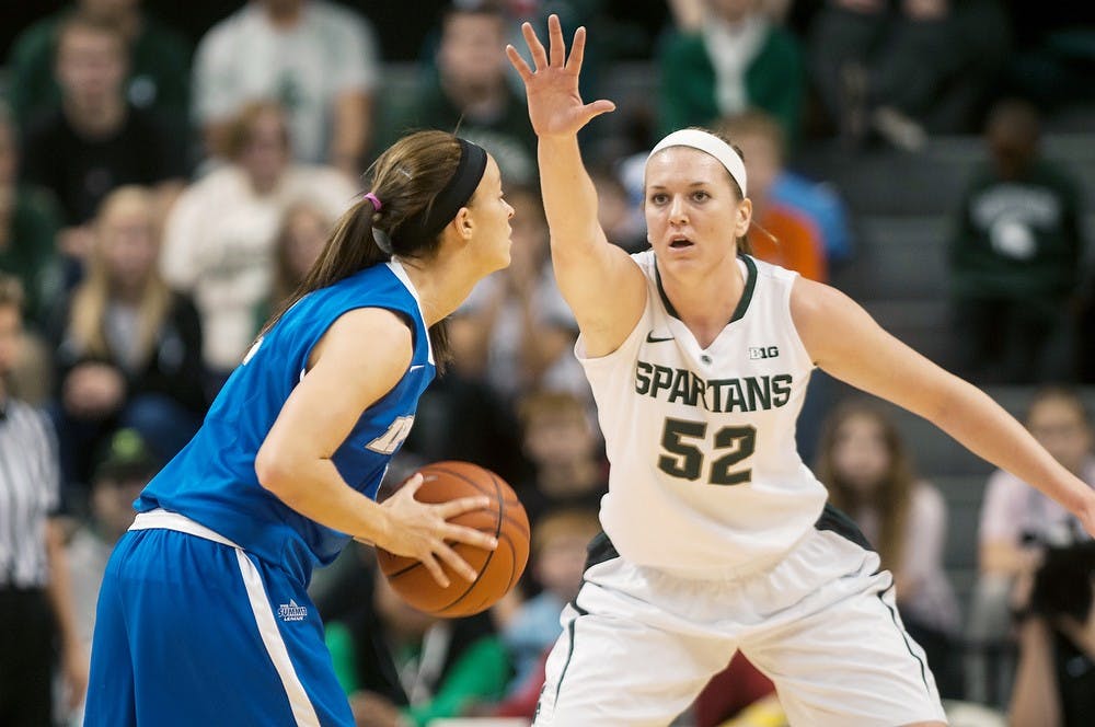 	<p>Junior forward Becca Mills defends <span class="caps">IPFW</span> guard Rachel Mauk Dec. 1, 2013, at Breslin Center. <span class="caps">IPFW</span> defeated <span class="caps">MSU</span>, 81-74. Margaux Forster/The State News</p>