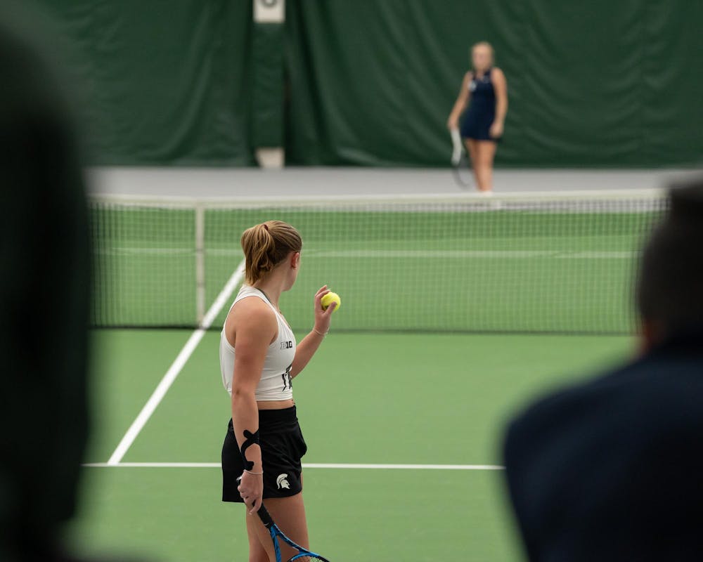 <p>MSU freshman Ellie Blackford prepares to serve against Xavier in their doubles match at the MSU Indoor Tennis Center on Jan. 24, 2025. Blackford went on to lose their double match six to three.</p>