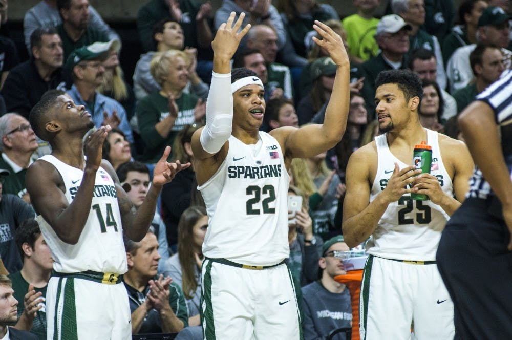 Freshman guard Miles Bridges (22) holds up his hands to represent a three point shot during the second half of the men's basketball game against Rutgers on Jan. 4, 2017 at Breslin Center. The Spartans defeated the Scarlet Knights, 93-65.