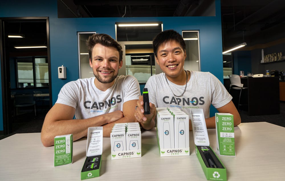 <p>CAPNOS co-founders, Brendan Wang and Jake Roach, pose with the CAPNOS Zero. Photo courtesy of Wang.</p>