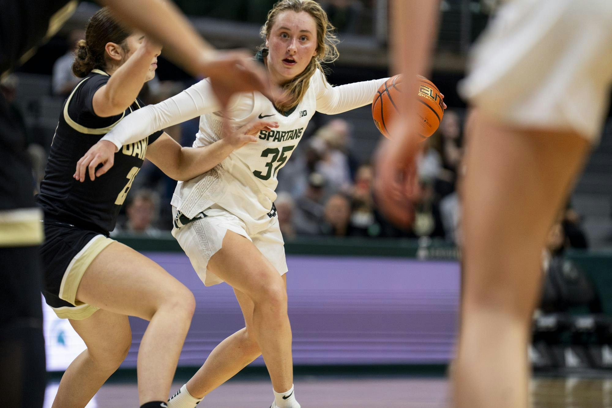 <p>Michigan State University redshirt freshman guard Kennedy Blair (35) avoids a defender during the MSU vs. Oakland University women's basketball game at the Breslin Student Center on Nov. 5, 2024.</p>