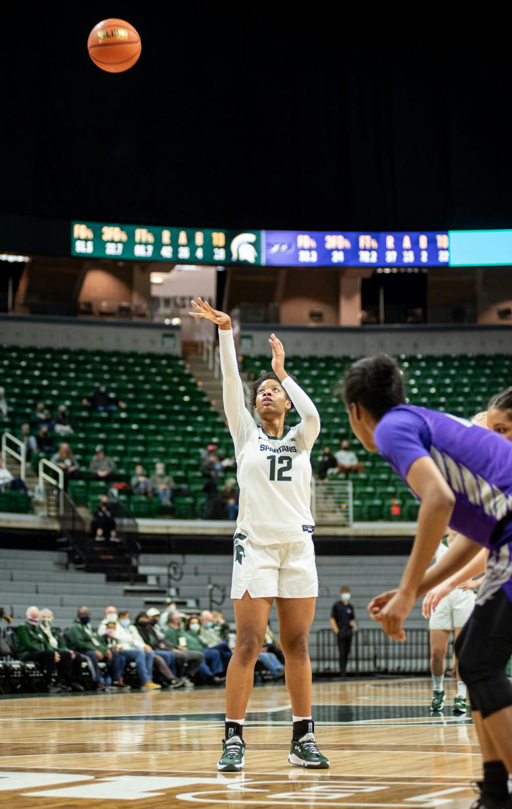 Freshman Isaline Alexander (12) shoots a freethrow during Michigan State's victory over the Niagara Purple Eagles on Nov. 14, 2021.
