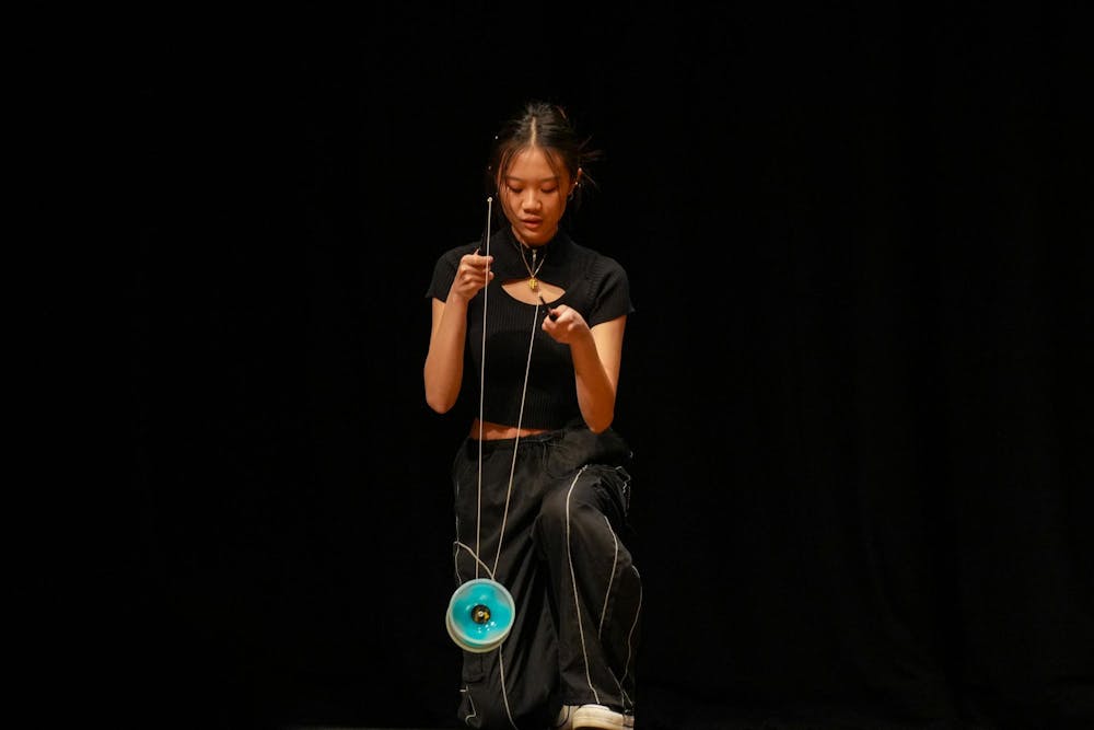 A member of Spartan Diablo performs with a yo-yo during the group’s “Feel the Inertia” routine at Cobb Great Hall in the Wharton Center on Feb. 7, 2026.