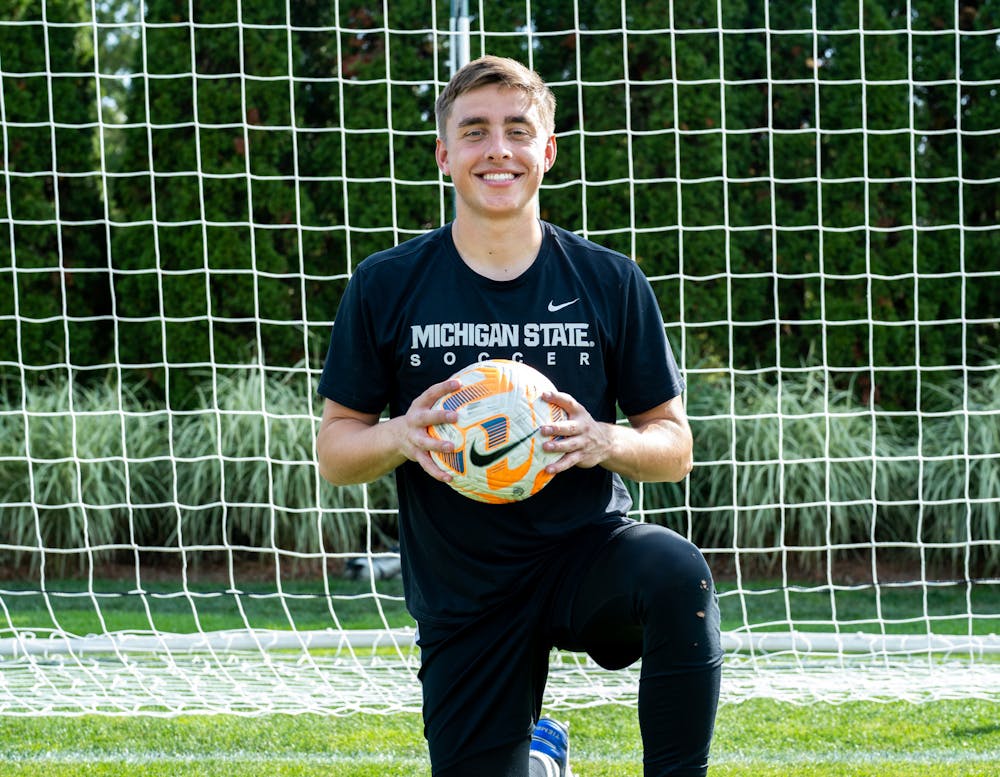 <p>MSU men&#x27;s soccer senior goalkeeper Owen Finnerty poses with a soccer ball at DeMartin field on Oct. 5, 2022. </p>