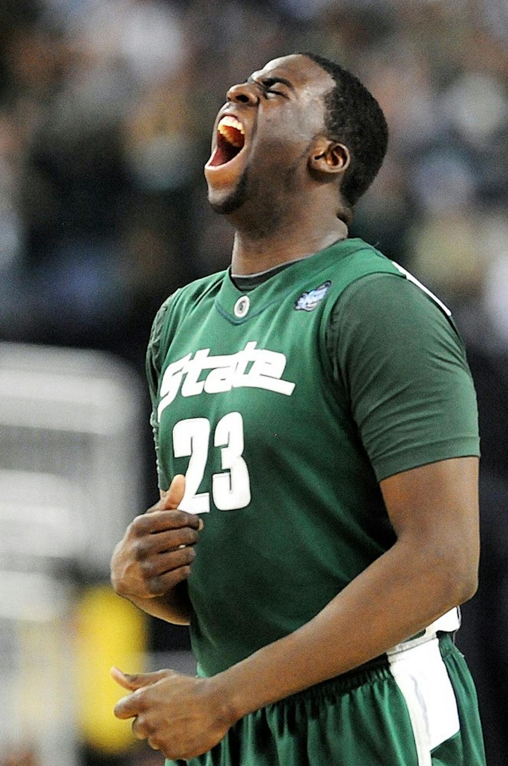 Freshman forward Draymond Green celebrates as the Spartans pulled ahead of Connecticut during Saturday?s national semifinal game at Ford Field in Detroit.