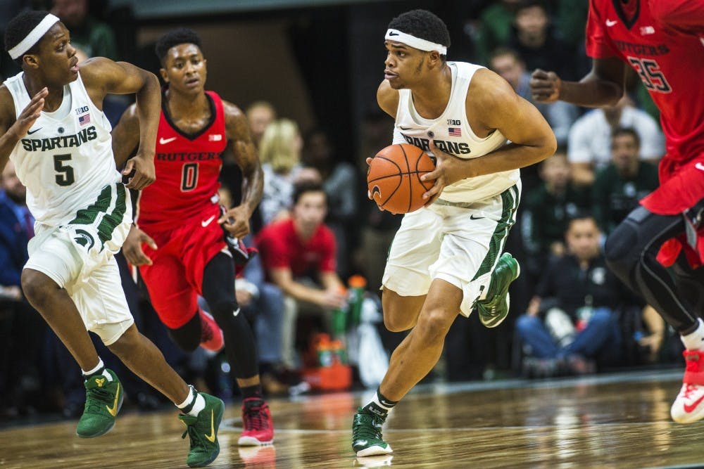 Freshman guard Miles Bridges (22) brings the ball down the court during the second half of the men's basketball game against Rutgers on Jan. 4, 2017 at Breslin Center. The Spartans defeated the Scarlet Knights, 93-65.