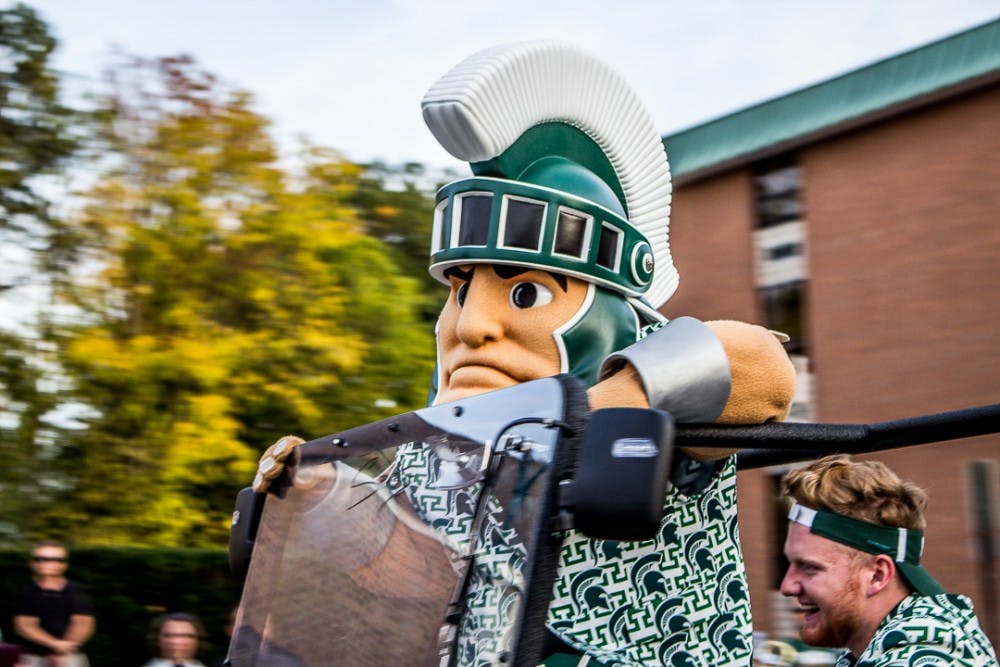 Sparty makes an appearance during the Homecoming Parade on Oct. 20, 2017 along Abbot Road. 
