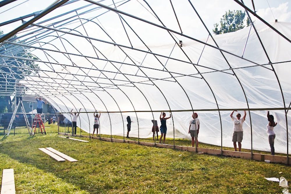 	<p>Green Economy Leadership Training, or <span class="caps">GELT</span>, participants, including several <span class="caps">MSU</span> students, worked to build a greenhouse in Highland Park, Mich., this summer.</p>