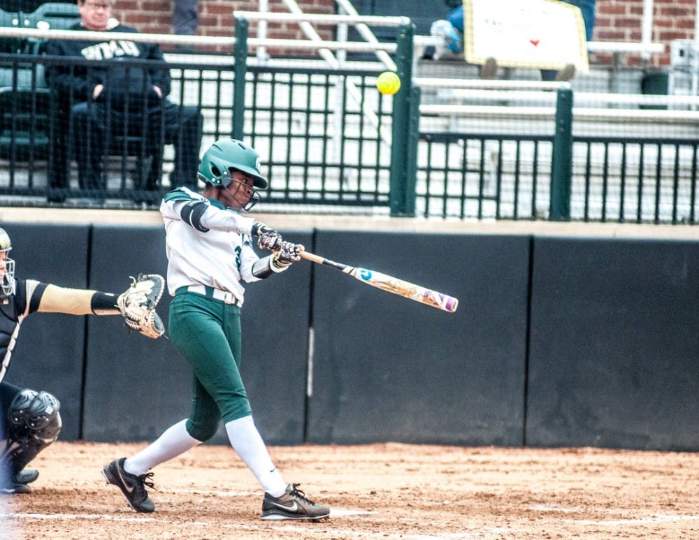 <p>Junior outfielder Ebonee Echols (3) hits the ball during the home opener game on March 28, 2018 at Secchia Stadium. The Spartans defeated the Broncos, 6-1.</p>