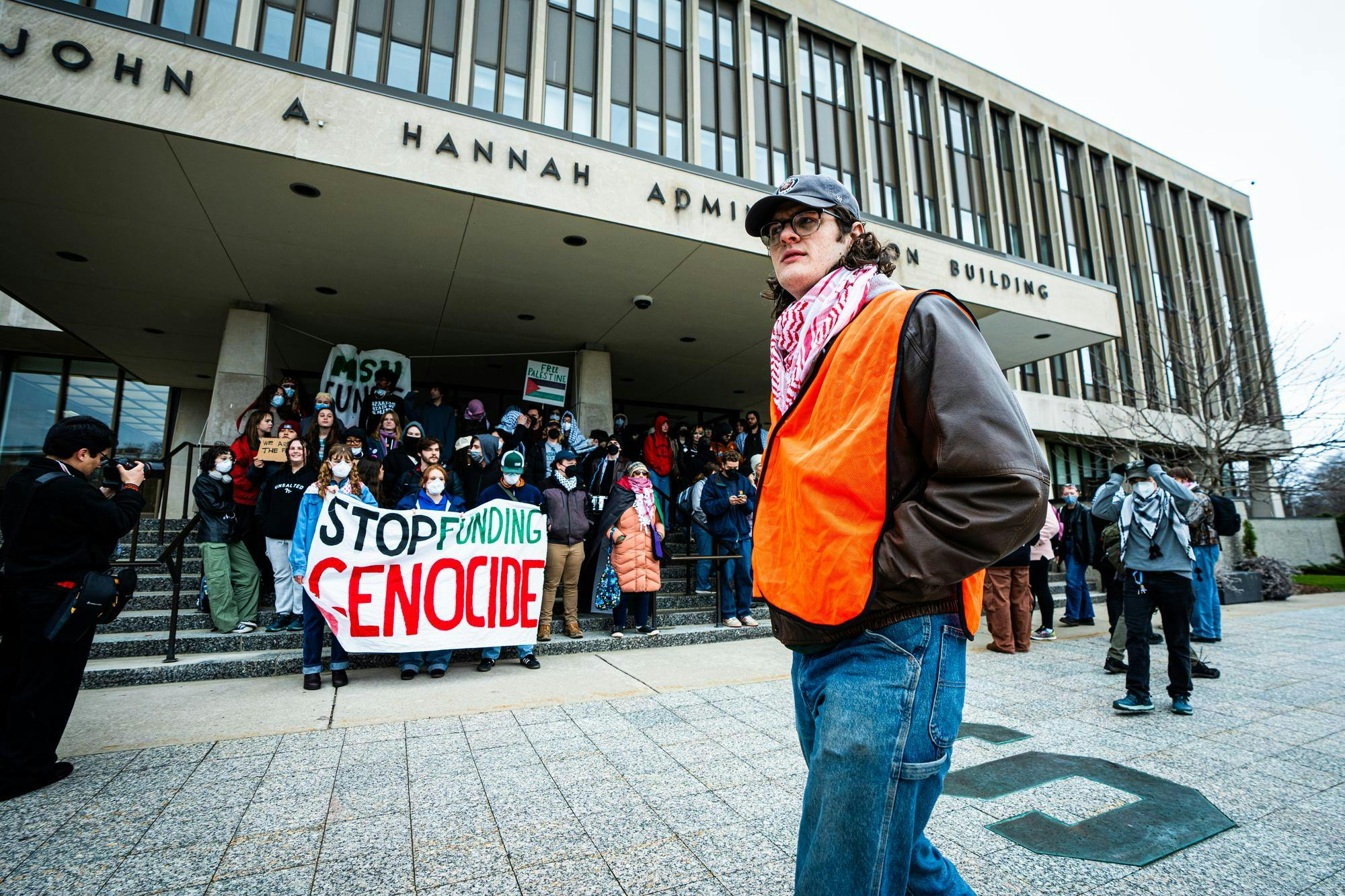 <p>A student protester patrols the perimeter during a Hurriya Coalition protest at the Hannah Administration building on April 10, 2025.</p>