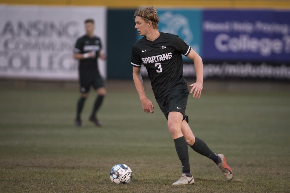 <p>Then sophomore defender Patrick Nielsen (3) handles the ball during the first half of the Capital Cup against Lansing Ignite FC at Cooley Law School Stadium in Lansing on Tuesday, April 16, 2019. (Nic Antaya/The State News)</p>