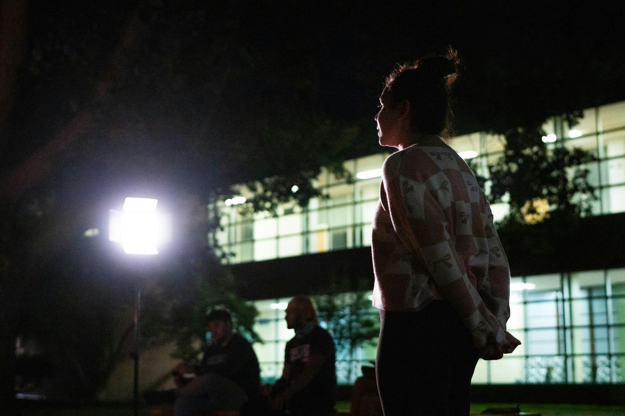 Survivor: MSU vice president Ava Ballagh announces the rules to contestants during the first tribal council of the season at Erickson Hall on Sep. 8, 2024.