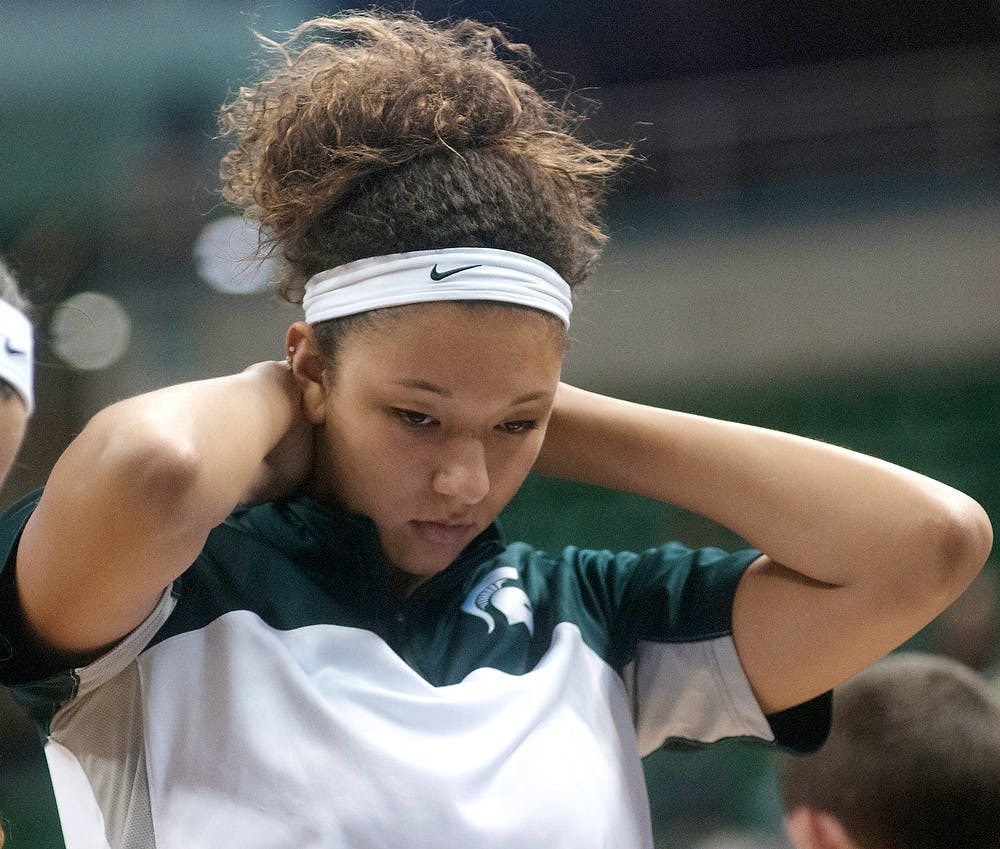 	<p>Junior center Madison Williams listens to head coach Suzy Merchant as she talks to the team during a time out on Jan. 23, 2014, at Breslin Center. The Spartans lost to Illinois, 61-51. Betsy Agosta</p>